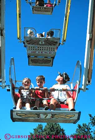 Stock Photo #5166: keywords -  amusement boy boys child children fair ferris festival fun gender girl girls mix park play radial ride summer thrill vert wheel