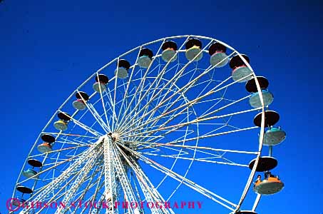 Stock Photo #5171: keywords -  amusement axis calgary circle fair ferris festival fun horz oval park play ride rotate rotating round spin stampede summer thrill wheel