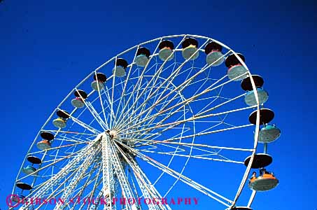Stock Photo #5171: keywords - amusement axis calgary circle fair ferris festival fun horz oval park play ride rotate rotating round spin stampede summer thrill wheel