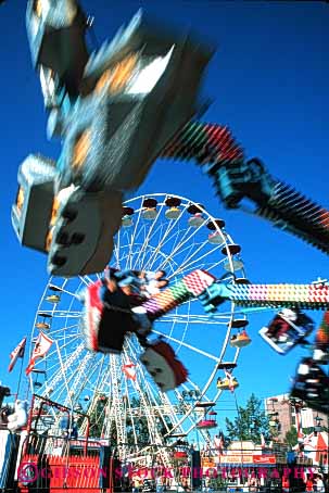 Stock Photo #5173: keywords -  amusement blur calgary fair festival fun motion move movement moving park play rides stampede summer thrill vert