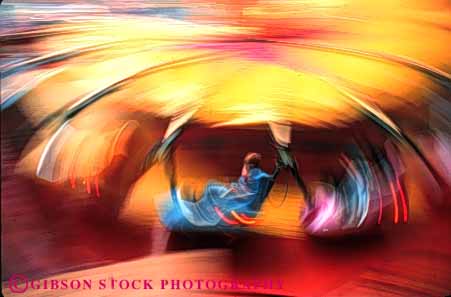 Stock Photo #5175: keywords - abstract amusement blur color colorful fair festival fun horz motion move movement moving park play ride rotate spin summer thrill