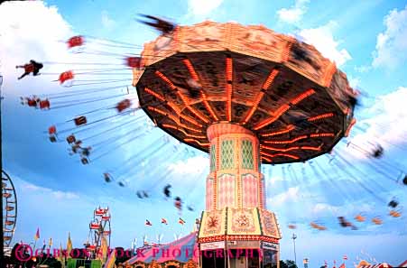Stock Photo #5177: keywords -  amusement centrifugal circle circular fair festival force fun horz park play ride rotate rotating spin spinning summer swing thrill