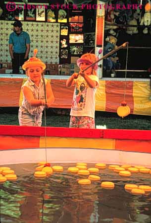 Stock Photo #5178: keywords - amusement child fair festival fishing fun game girl girls midway park play released summer thrill vert