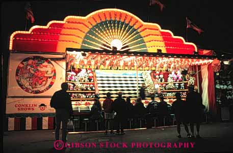 Stock Photo #5180: keywords -  amusement attraction calgary fair festival fun game horz light lighting midway night park play stampede summer