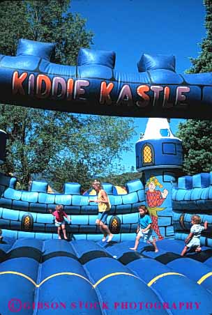 Stock Photo #5190: keywords -  air amusement area balloon blur bounce fair festival fun inflatable inflate inflated park play summer thrill vert