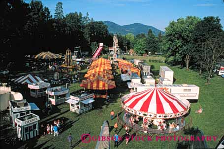 Stock Photo #5193: keywords - above activity aerial amusement attraction attractions carnival carnivals carousel colorful elevate elevated event fair fairs festival festivals fun grants horz midway midways mobile of oregon over overhead overview park pass people person play portable recreation ride rides summer temporary tent thrill view