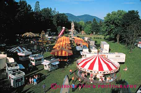 Stock Photo #5193: keywords -  above activity aerial amusement attraction attractions carnival carnivals carousel colorful elevate elevated event fair fairs festival festivals fun grants horz midway midways mobile of oregon over overhead overview park pass people person play portable recreation ride rides summer temporary tent thrill view