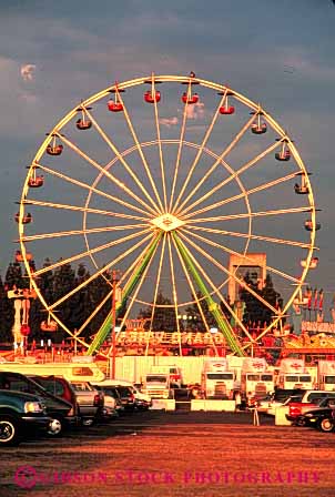 Stock Photo #5195: keywords -  amusement axis california circle circular fair ferris festival fun geometric geometrical park play radial ride rotate rotating round sacramento spin state summer symmetrical symmetry thrill turn vert wheel