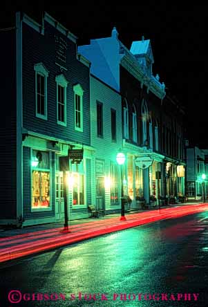 Stock Photo #5212: keywords -  america american buildings city colorado community georgetown glare light lighting neighborhood night reflection rural safe safety secure security shops small street town vert water wet