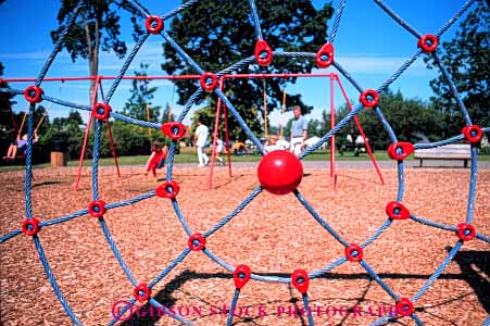 Stock Photo #5232: keywords -  childhood clean climb climbing color colorful geometric geometry ground horz metal new plastic play playground radial radially safe shape shapes spider symmetrical symmetry toy web