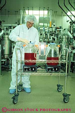Stock Photo #5242: keywords - bio-medical bio-medicine biochem biochemical biochemistry bioengineer bioengineering bioengineers biomedical bioscience career chemical chemicals chemistry clean cleanroom equipment exact extract genetech high industry job lab laboratory man manufacture manufacturing medical molecular occupation organic precise precision process released research room sanitary science solution sterile suit tank tech technical technician technicians technology vert vocation work worker working