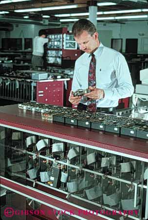 Stock Photo #5252: keywords - assembly career check computer control electric electrical electricity employee equipment exact high industry job man manufacture manufacturing occupation precise precision quality released research science tech technical technician technicians technology test testing vert vocation wire wiring work worker working
