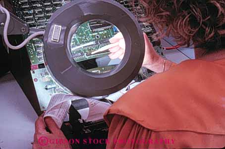 Stock Photo #5254: keywords - career close closely computer detail electric electrical electricity employee enlarge equipment exact high horz industry job lens light lighted look magnifier magnify magnifying manufacture manufacturing occupation precise precision research science see tech technical technician technicians technology test testing tool use view vision vocation woman work worker working