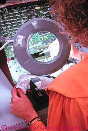 Stock Photo #10917: keywords -  board career circle circuit circular computers electronic electronics examine examines industry job jobs lens magnifier magnify magnifys observe observer observes observing occupation round shape shapes study technician technology test testing through vert woman women work worker workers working works