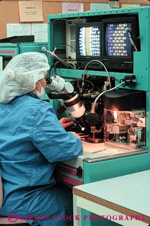 Stock Photo #5264: keywords - career clean close closely component computer detail electric electrical electricity employee enlarge equipment exact examine high industry job light lighted look manufacture manufacturing occupation person precise precision research room science see tech technical technician technicians technology tool vert view vision vocation work worker working