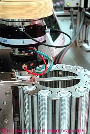 Stock Photo #5281: keywords - assemble assembling assembly automate automated automation computer disk drive electric electrical electricity electronic electronics equipment exact hard high industry machine machines manufacture manufacturing mechanical precise precision robot robotic robotics science tech technical technology vert