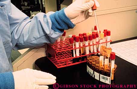 Stock Photo #3409: keywords -  analysis experiment fluid glove gown hands horz industry laboratory measure medical safety technician test tube