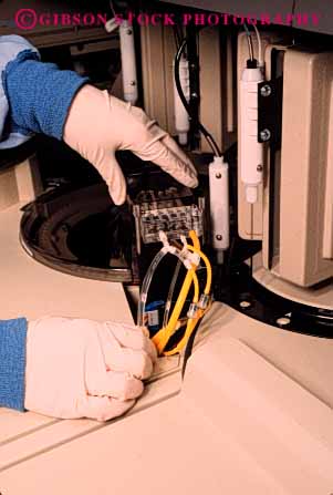 Stock Photo #5292: keywords - career compare equipment examine glove gloves hand hands health hospital job lab labor laboratories laboratory latex machine medical medicine occupation protection research review study technical technician technicians tested tester testing transparent vert vocation work worker working