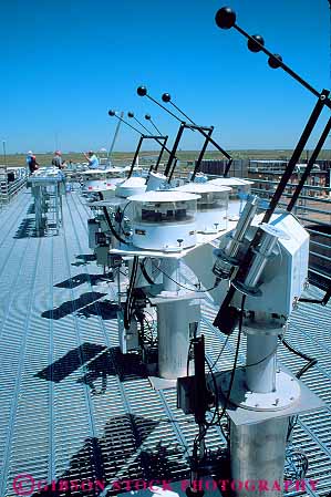 Stock Photo #12574: keywords - collect colorado diffused energy equipment experiment experiments facility federal golden government high industrial industry laboratory machine modern national plant project pyrheliometers radiation renewable research researches researching science scientific solar stainless steel sun sunlight tech technological technology vert