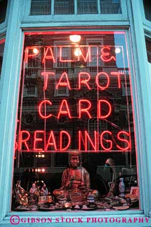 Stock Photo #5316: keywords -  advertise advertisement business card forecast foresee fortune metaphysical metaphysics neon palm perceive perception predict prediction psychic psychophysics reader see seer sense sensory sign spirit spiritual store storefront tarot teller vert window