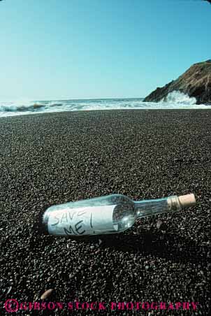 Stock Photo #5319: keywords -  beach bottle coast communicate communicating communication drift emergency float glass in lost me message ocean paper rescue save sea shore strand stranded survivor vert water word write