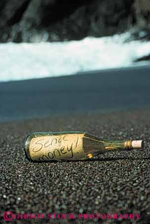 Stock Photo #5320: keywords -  beach bottle coast communicate communicating communication drift emergency float glass in lost message money ocean paper rescue sea send shore strand stranded survivor vert water word write