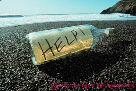 Stock Photo #5322: keywords -  beach bottle coast communicate communicating communication drift emergency float glass help horz in lost message ocean paper rescue sea shore strand stranded survivor water word write