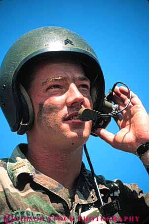 Stock Photo #5335: keywords - armed army blend camouflage combat communicate communicating communication communications defend defense fight forces helmet hide military pattern radio released soldier uniform vert war weapon