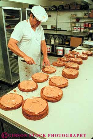 Stock Photo #5363: keywords -  bake baker baking bread cake cakes career commercial cook cooking create crust dough employee food industry interior job layer make manufacture manufacturing occupation oven place released vert vocation work worker working