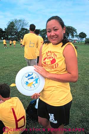 Stock Photo #5373: keywords -  adult asian class college ethnic field frisbee gender girl group high interaction man men minority mixed recreation school social sport student students team teen teenager teenagers trip ultimate uniform vert woman women yellow young