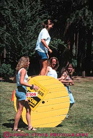 Stock Photo #5378: keywords -  accompany adult balance circle circular class field game girls group high interaction recreation roll round school social spool sport stand student students summer teen teenager teenagers trip vert woman women young