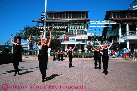 Stock Photo #5384: keywords -  adult black class coordinate coordinated dance dancers dancing field florida girls group harmony high horz interaction jacksonville perform performance recreation school show social sport student students summer teen teenage teenager teenagers together trip uniform unison unity woman women young