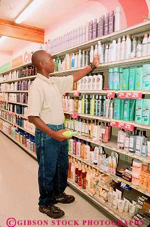 Stock Photo #13675: keywords -  adolescent adolescents african american black boy boys child children ethnic ethnicity health hygiene inventory male minority preteen race released shampoo shelf shelves shop shopper shoppers shopping shops store stores student students supermarket teen teenage teenager teenagers teens vert young youth