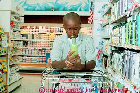 Stock Photo #13676: keywords - adolescent adolescents african american black boy boys child children ethnic ethnicity health horz hygiene in label male minority preteen race read reader readers reading reads released shampoo shop shopper shoppers shops store student students supermarket teen teenage teenager teenagers teens young youth