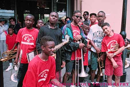 Stock Photo #5415: keywords -  adolescence adolescent adolescents adult african band black boys class close ethnic field friend friends group high horz instruments interaction junior man men middle minority music musical outdoor outdoors outside recreation school social sound student students summer teen teenager teenagers teens trip young