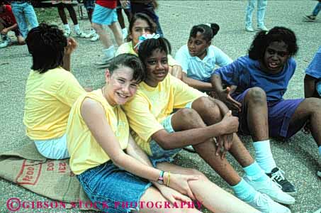 Stock Photo #5416: keywords - adolescence adolescent adolescents adult black class ethnic field friend girls group high horz interaction junior middle minority mix mixed outdoor outdoors outside recreation school social student students summer teen teenager teenagers teens trip woman women young