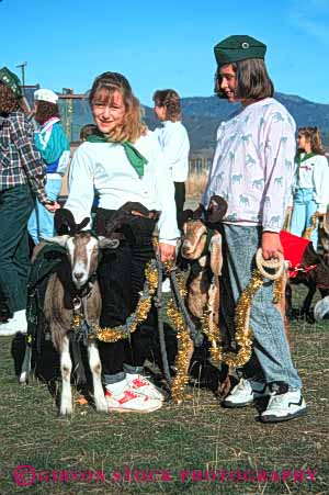 Stock Photo #5419: keywords - adolescence adolescent adolescents adult animal animals class friend friends girls goats group high interaction junior mammal middle outdoor outdoors outside pet pets recreation social student students summer teen teenager teenagers teens trip vert with woman women young