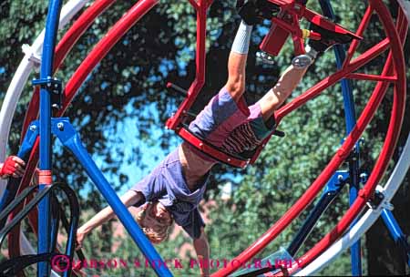 Stock Photo #5434: keywords - adolescence adolescent adult balance boy boys children class equilibrium friend friends group high horz interaction junior man men middle move outdoor outdoors outside recreation ride rotate rotating school social spin student students summer teen teenager teenagers teens thrill young