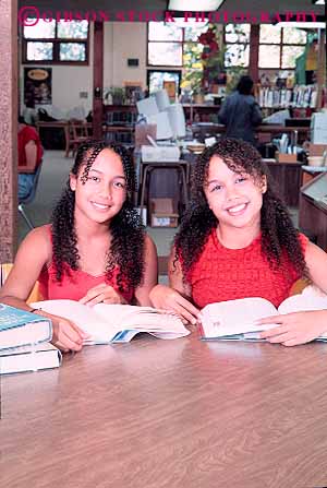 Stock Photo #12740: keywords -  adolescent adolescents african american black book books child children cute ethnic face faces friend friends genetic genetics girls happy head heads identical in libraries library minority pretty read reading released same sameness sibling siblings sister sisters smile smiles student students study studying teen teenage teenager teenagers teens twin twins two vert young youth