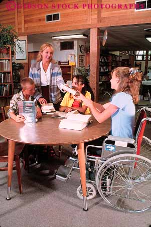 Stock Photo #12744: keywords -  adolescent adolescents african american assist assistance assisting black book books boy challenge challenged chat chatting child children disability disable disabled disadvantage disadvantaged ethnic friend friends gender girls group handicap handicapped help helper helping in job librarian libraries library minority mixed physical physically race read reading released sit sits sitting social student students talk talking teach teacher teaching teen teenage teenager teenagers teens vert wheelchair wheelchairs woman work young youth