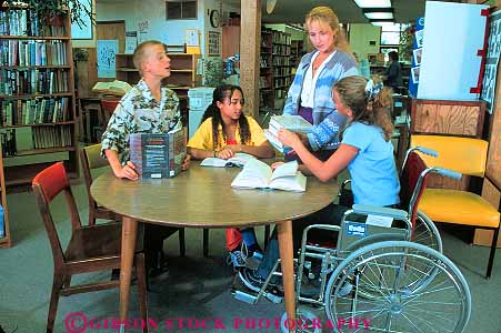 Stock Photo #12745: keywords -  adolescent adolescents african american assist assistance assisting black book books boy challenge challenged chat chatting child children disability disable disabled disadvantage disadvantaged ethnic friend friends gender girls group handicap handicapped help helper helping horz in job librarian libraries library minority mixed physical physically race read reading released sit sits sitting social student students talk talking teach teacher teaching teen teenage teenager teenagers teens wheelchair wheelchairs woman work young youth