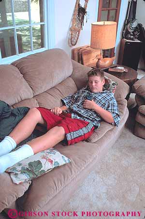 Stock Photo #13378: keywords - adolescent adolescents asleep boy boys child children couch doze dozes dozing falls home inside interior male nap napping naps people relax relaxed relaxes relaxing released sleep sleeping sleeps teen teenage teenager teenagers teens vert young youth