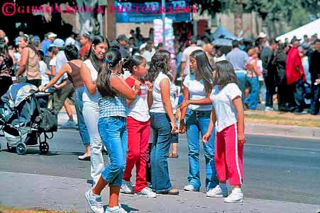 Stock Photo #19989: keywords - adolescent adolescents america angeles california central child children de ethnic fair fairs festival festivals friend friends friendship girl girls group groups hispanic horz latino los mexican minority people person pueblo social teen youth