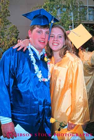 Stock Photo #5444: keywords - academic achieve achievement achieving acknowledge advance advancement affection blue boy celebrate celebration class close color couple diploma distinguish distinguished educate educated education elevate enhance forward friend friends friendship gown gowns graduate graduating graduation group high hug improve improvement lift man move promote promotion recognition recognize recognized school share student students team threshold together uniform up vert woman worth worthy yellow young