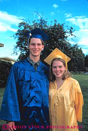 Stock Photo #5445: keywords - academic achieve achievement achieving acknowledge advance advancement affection blue celebrate celebration class close color couple diploma distinguish distinguished educate educated education elevate enhance forward friend friends friendship gown gowns graduate graduating graduation group high hug improve improvement lift man move promote promotion recognition recognize recognized school share student students team threshold together two uniform up vert woman worth worthy yellow young