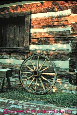 Stock Photo #5460: keywords -  atmosphere cabin equipment home log motif old style vert wagon west western wheel