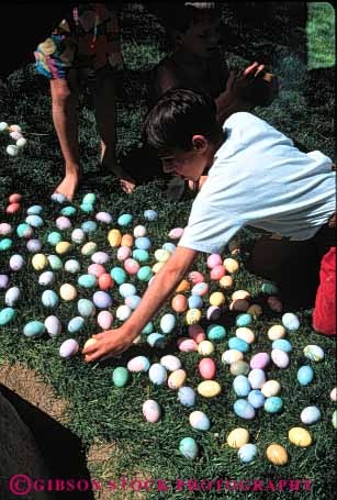 Stock Photo #5463: keywords - boy boys celebrate celebrating celebration child children christian christianity colored dye dyed easter egg eggs faith holiday kid religion religious round vert youth