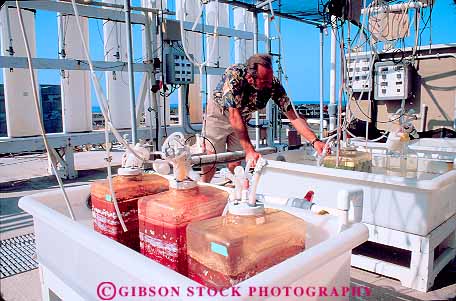 Stock Photo #11413: keywords -  algae aquaculture biologist biology commerce company cultivate cultivating cultivation cyanotech equipment growing hawaii horz in industry kona lab laboratory life mariculture marine ocean plant plants research researcher science scientific scientist seawater technician technology